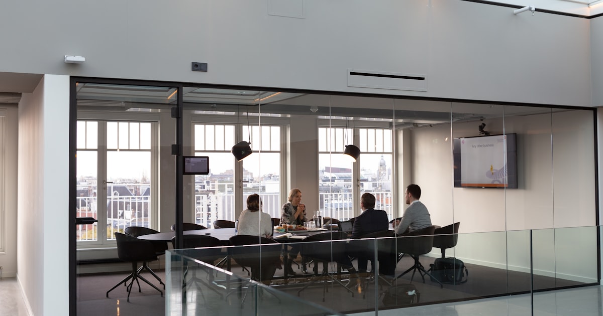 people sitting on chair inside building